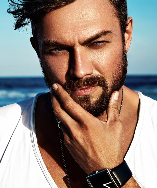 man with beard in v-neck shirt